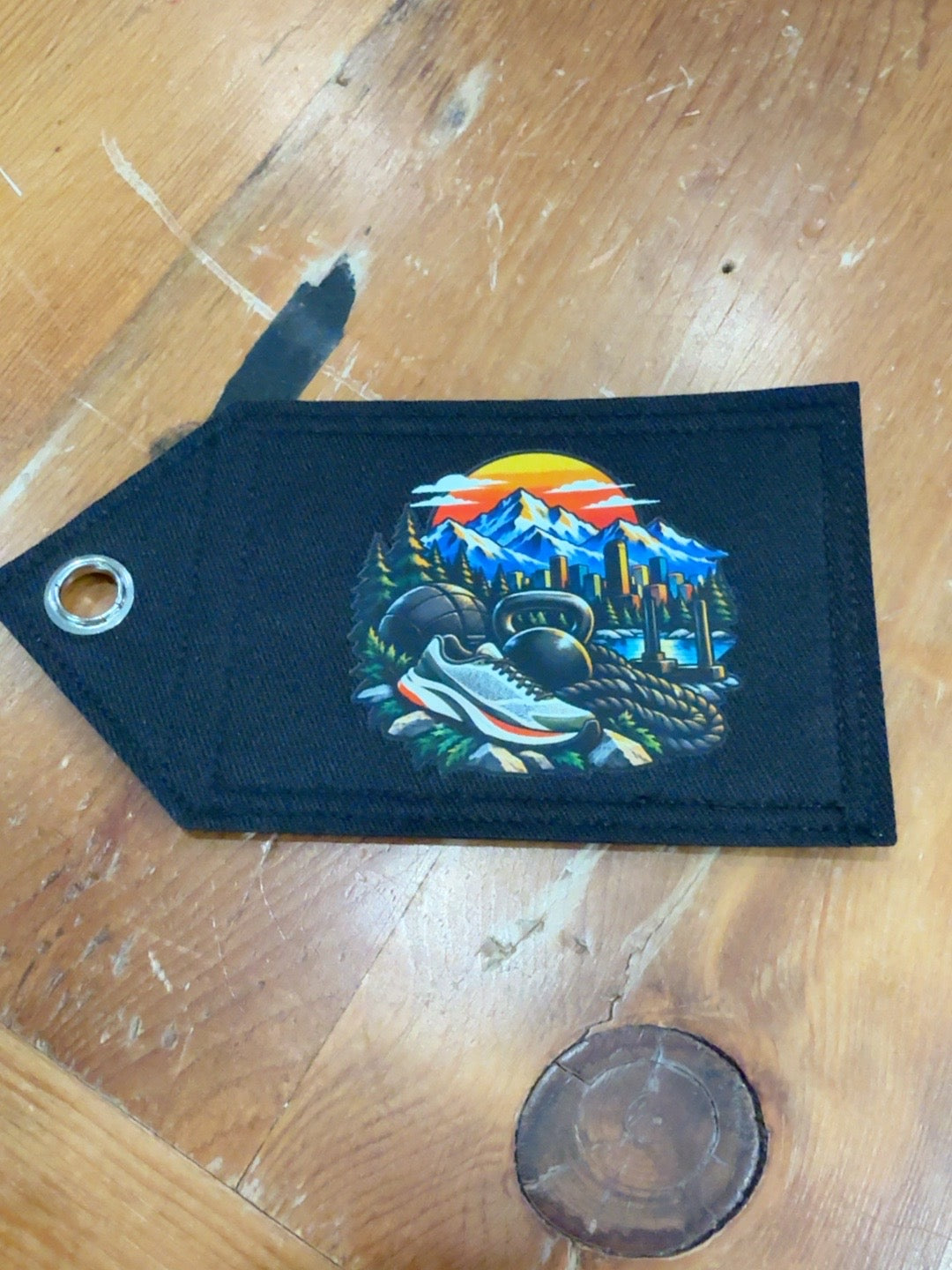 Denver Rocky Mountains black Patch Tag with mountain sunset, city skyline, running shoe, kettlebell and battle rope